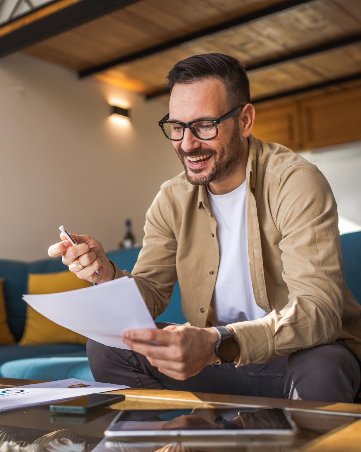 Satisfied customer reviewing insurance documents